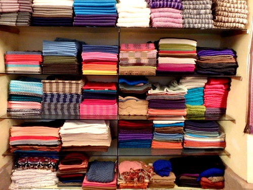 Colorful selections of cloth work (for sale).
